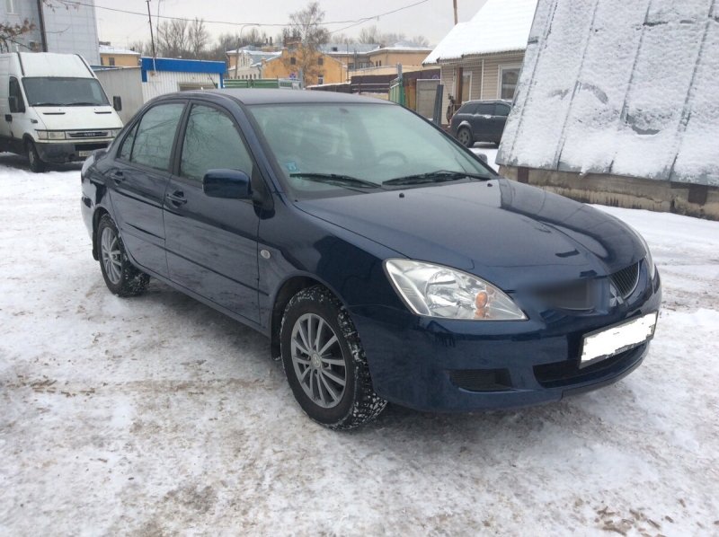Митсубиси Лансер 2003 года