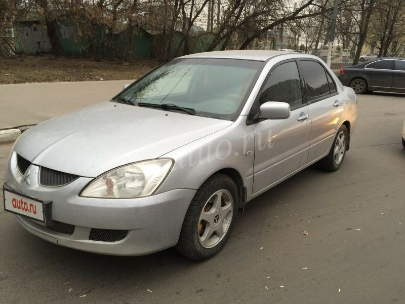 Лансер 9 2003