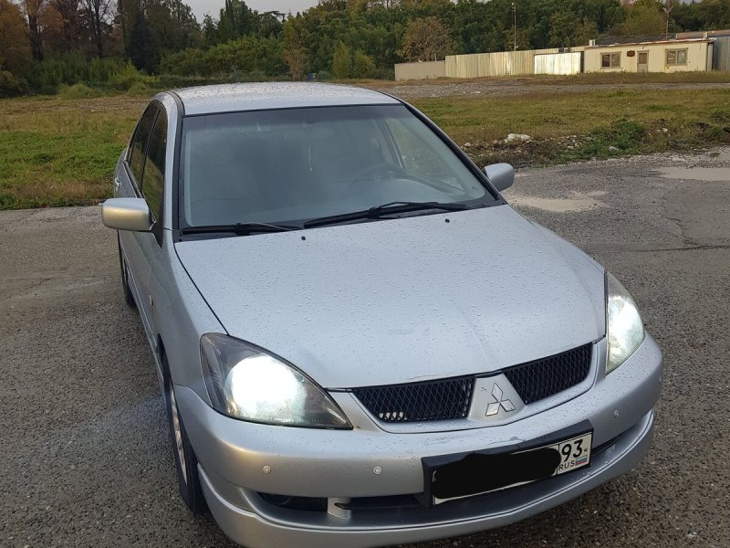Мицубиси Lancer 2003