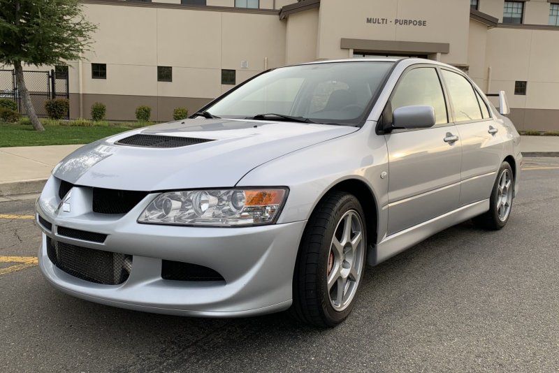 Мицубиси Lancer 2003