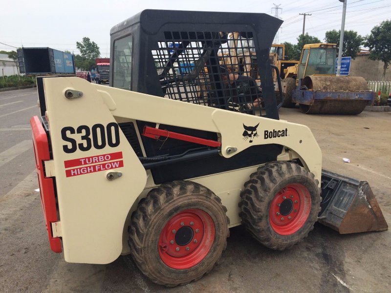 2000 Bobcat Skid Steer #753 and 2006 Bobcat s300