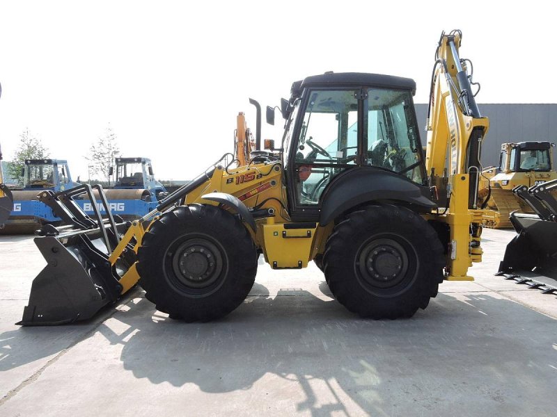 Экскаватор-погрузчик New Holland в115в