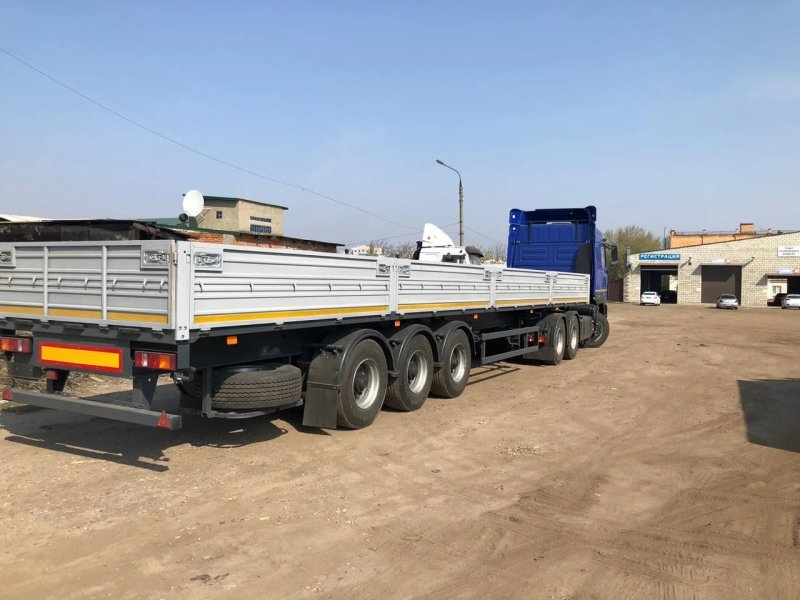 Полуприцеп бортовой МАЗ 975800