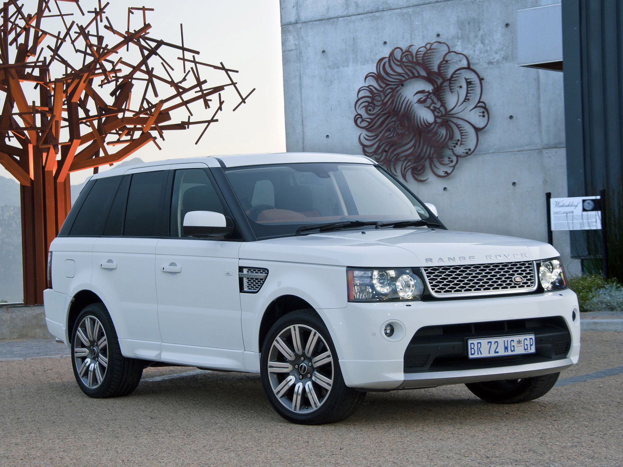 Range sport 2011. Land Rover range Rover Sport 2012. Белый Рендж Ровер спорт 2012. Лэнд Ровер Рэйндж Ровер спорт 2012. Range range Rover Sport 2012.