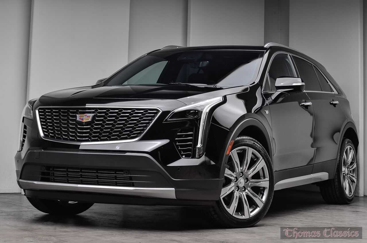 H new. Cadillac xt4 2021. Кадиллак xt4 2022. Cadillac xt4 2020. Новый Кадиллак 2022.