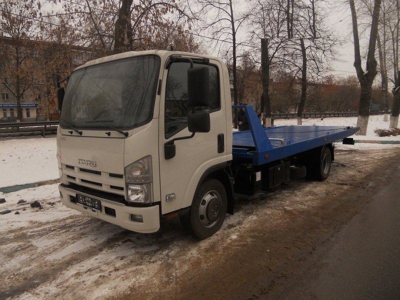 Isuzu npr75 эвакуатор со сдвижной платформой