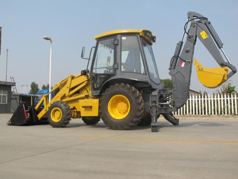 Трактор желтый с ковшом настоящий JCB