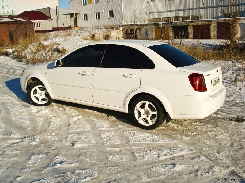 Chevrolet Lacetti 1.8 белый тонировка