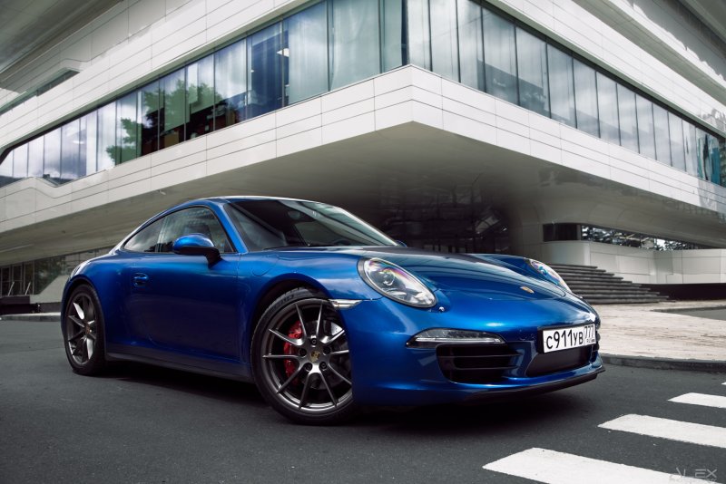 Порше 911 Каррера голубая