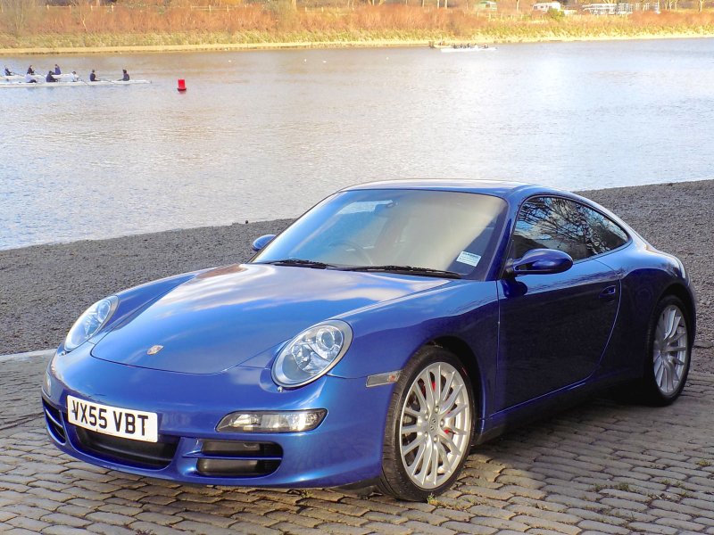Порш синий Каррера 911 s