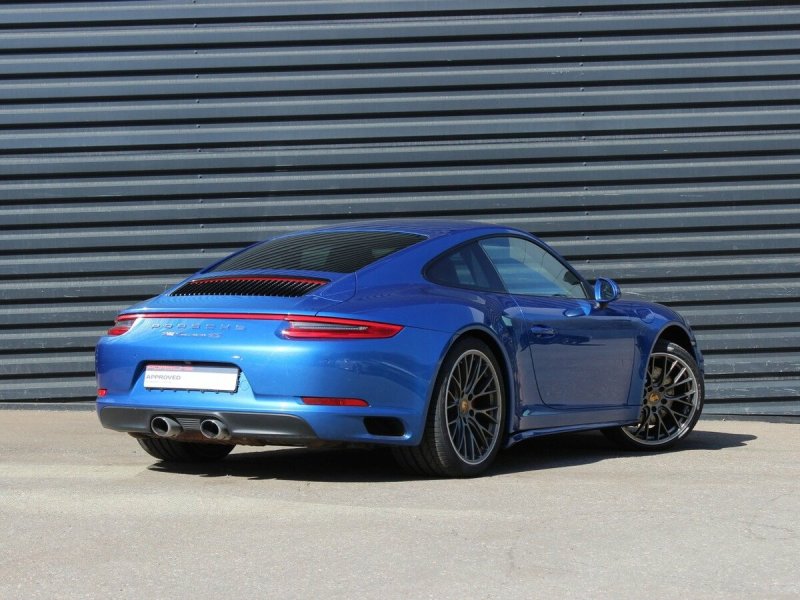 Порше 911 Carrera 4s голубой