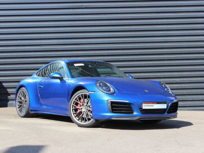 Порше 911 Carrera 4s голубой