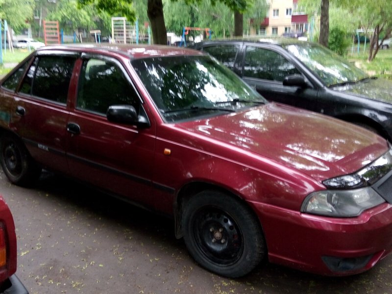 Daewoo Nexia 1 Рестайлинг бордовая