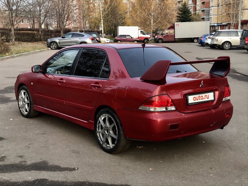 Лансер 9 2006 красный
