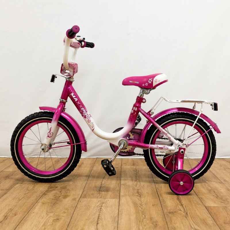 Маленький розовый велосипед