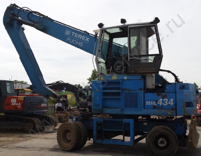 Fuchs MHL 434 перегружатель