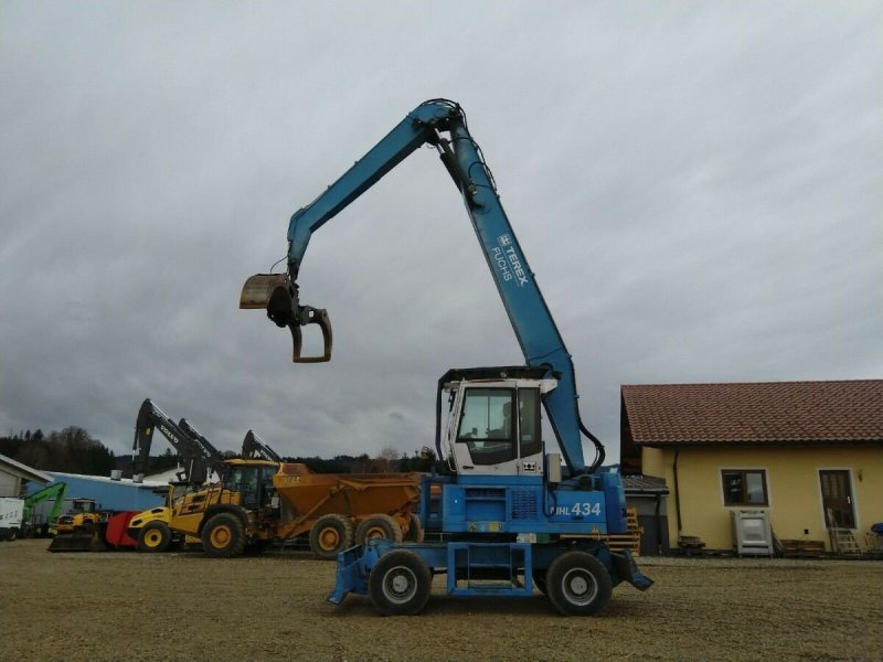 Fuchs MHL 434 перегружатель