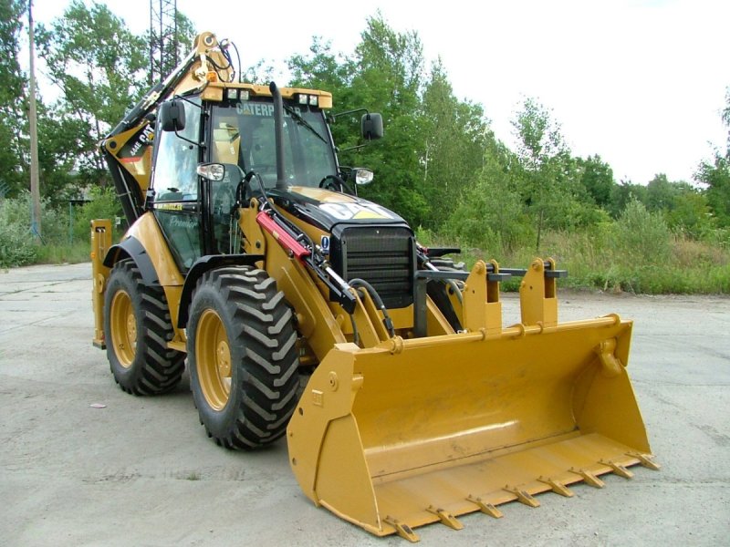 Погрузчик – экскаватор Caterpillar 444f