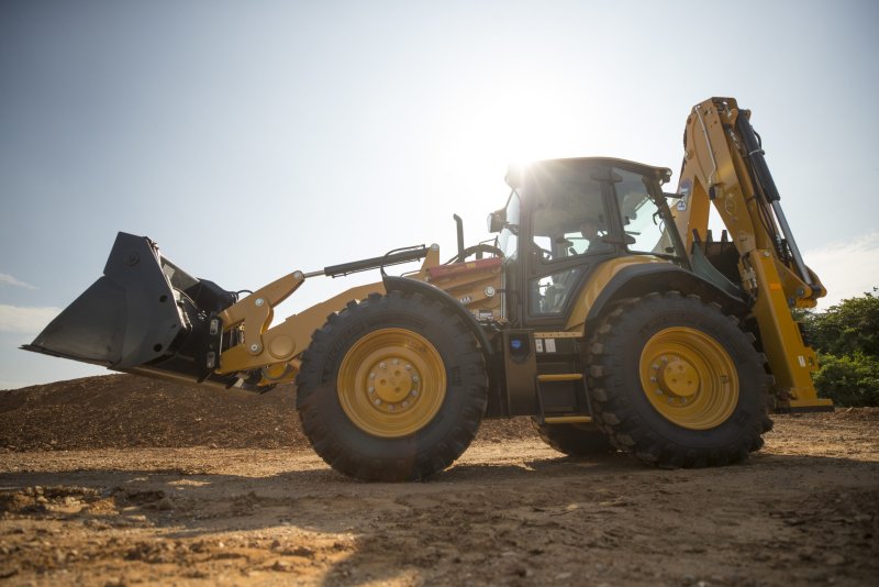 Экскаватор-погрузчик Caterpillar 444