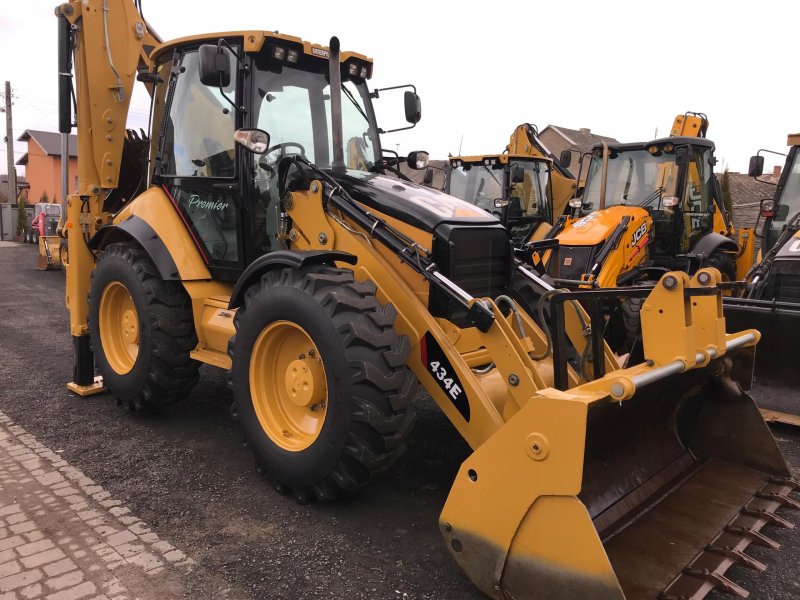 Caterpillar 444e экскаватор