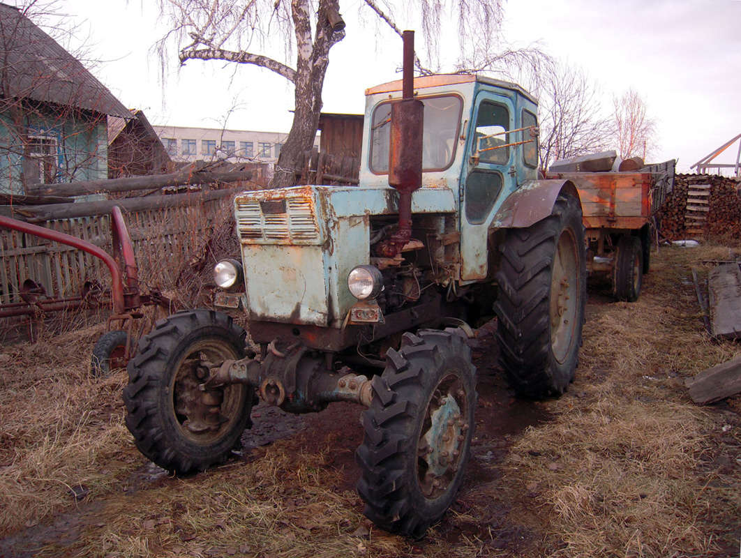Купить трактор бу в иркутской области. Трактор ЛТЗ 40 ам. Трактор т40 1986. Трактор т-40 ам 1989 г. Трактор т-40 ам салон.