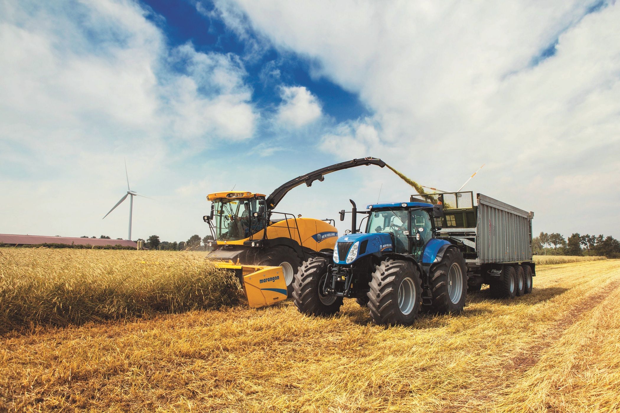 Holland agriculture. Ротор Нью холод комбайн. Трактор и комбайн Нью Холланд. Трактор Нью Холланд т6090. Трактор Нью Холланд в поле.