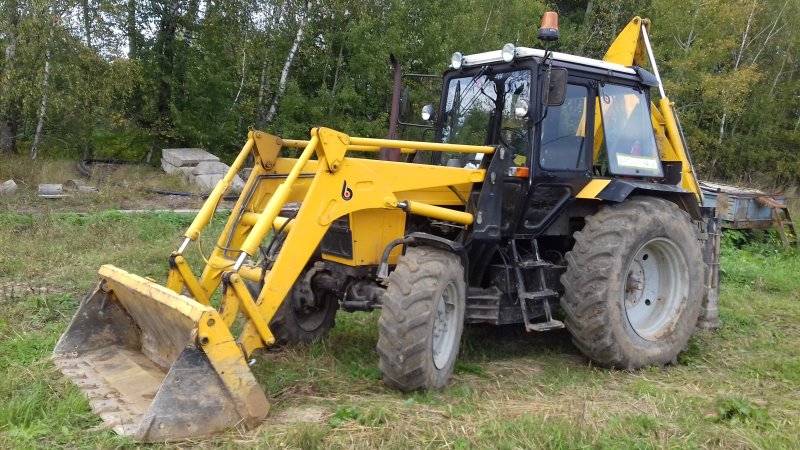 Челюстной экскаватор погрузчик ДЭМ 114