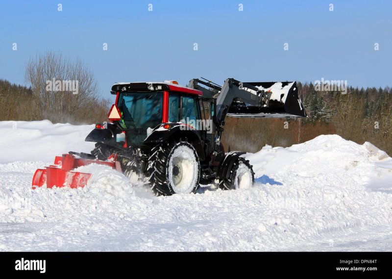 Snow plowing tractor