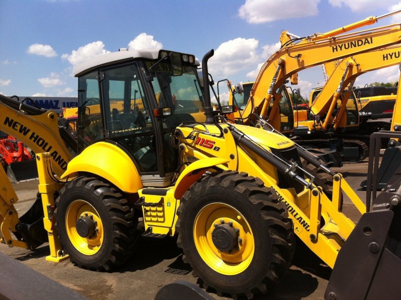 Погрузчик New Holland 115