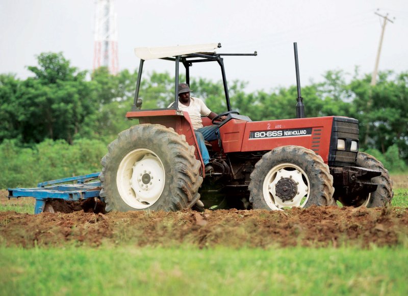 Farmers in tractor