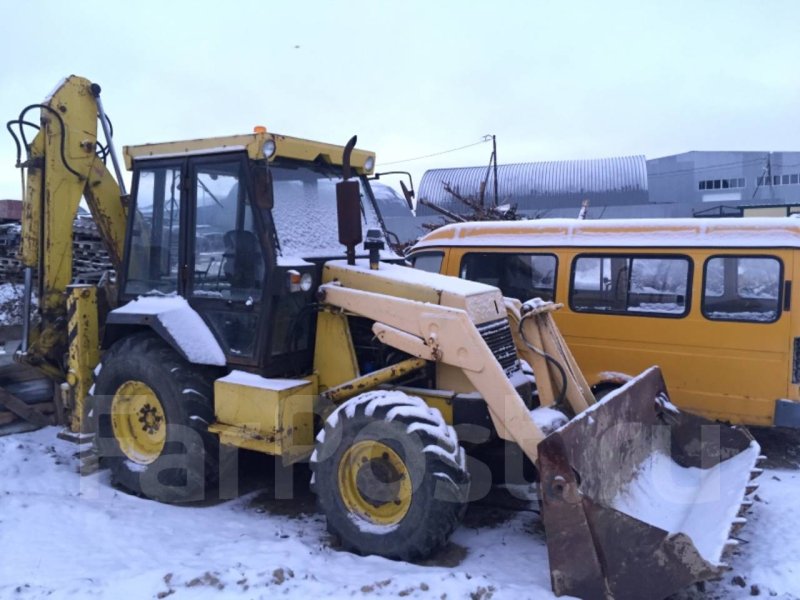 АТЕК 2325 экскаватор погрузчик