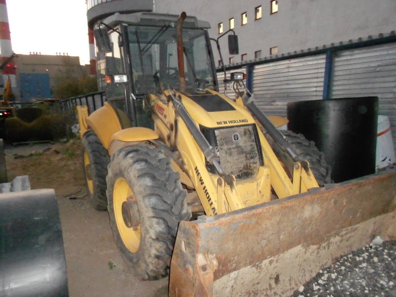 Экскаватор-погрузчик New Holland в115в