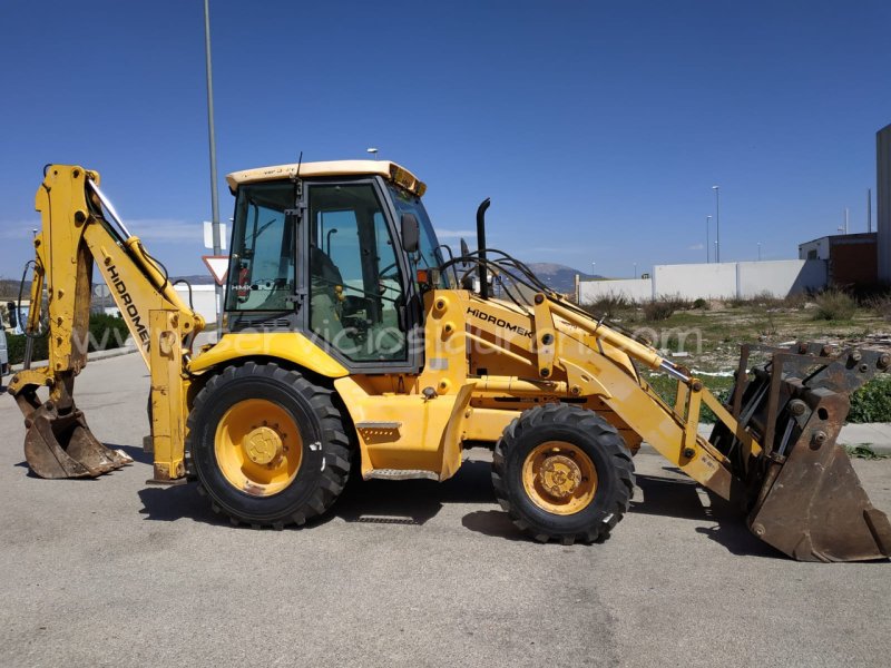 Hidromek 102 экскаватор-погрузчик