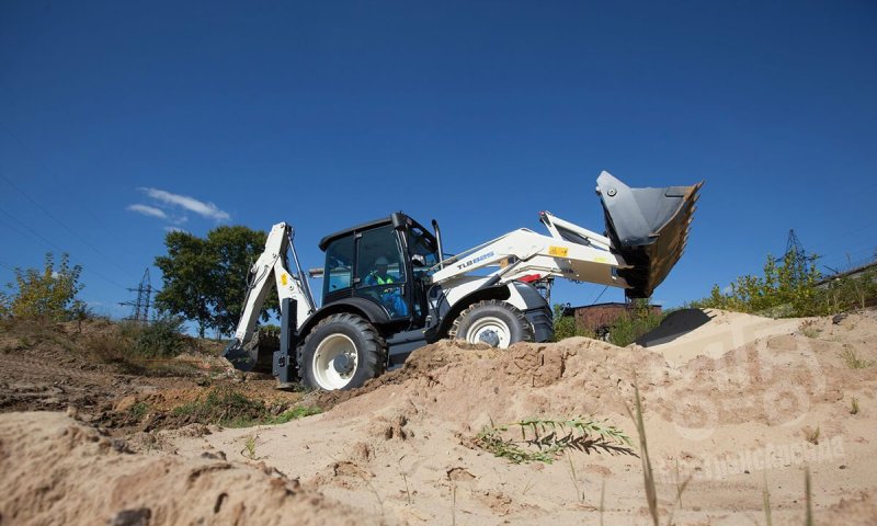 Экскаватор погрузчик Terex 825