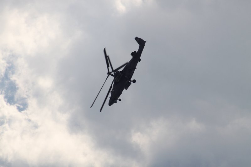 Город Арсеньев и ка 52 в воздухе