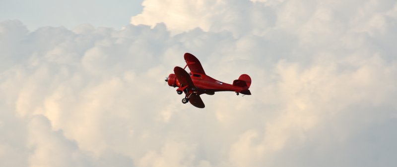 Red plane in Sky