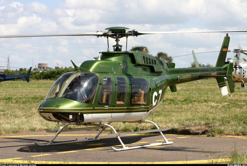 Bell 407 вертолёт зеленый