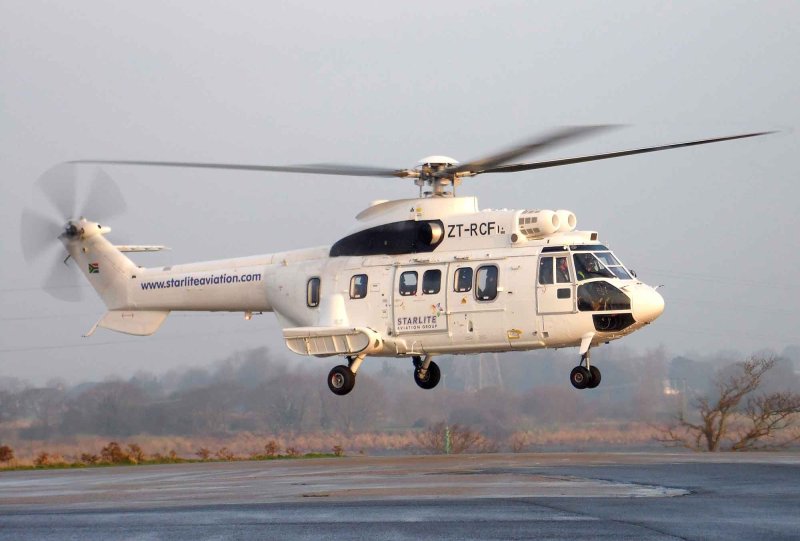 Вертолет as 332 super Puma