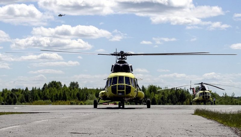 Вертолет ми 8 в тайге